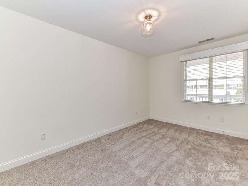 8925 Rosalyn Glen Road, Cornelius, NC 28031.  MLS# CAR4282773, YatesRealty ID 9965. Spacious Bedroom 2!