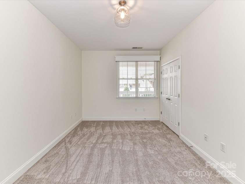 8925 Rosalyn Glen Road, Cornelius, NC 28031.  MLS# CAR4282773, YatesRealty ID 9965. Spacious Bedroom 2!