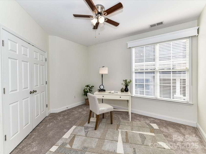 8925 Rosalyn Glen Road, Cornelius, NC 28031.  MLS# CAR4282773, YatesRealty ID 9965. Spacious Bedroom 3 currently staged as Office with ceiling fan/light!