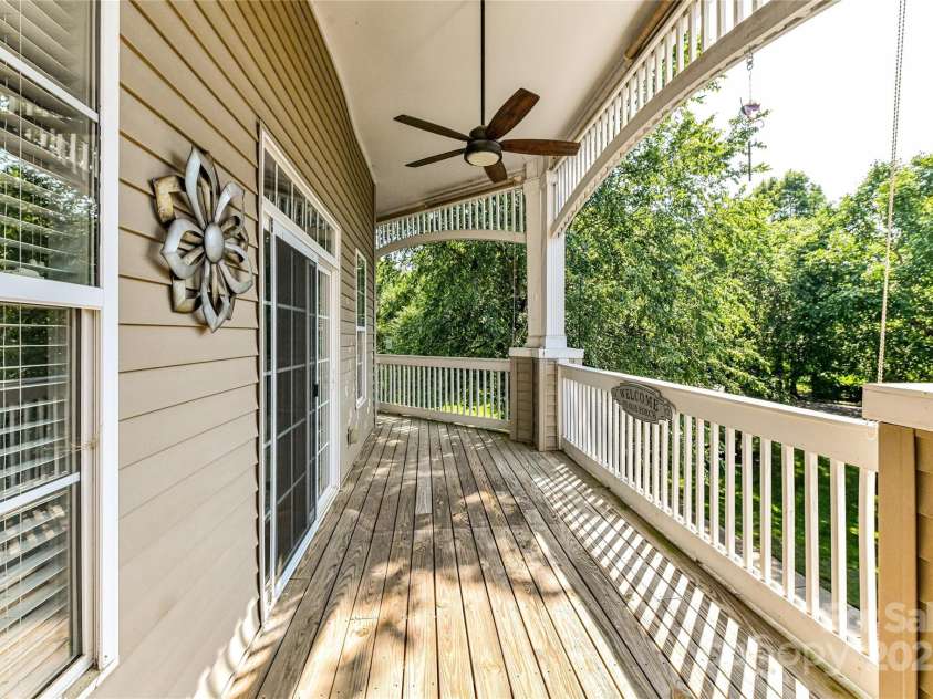 8925 Rosalyn Glen Road, Cornelius, NC 28031.  MLS# CAR4282773, YatesRealty ID 9965. Spacious, Wrap Around porch with ceiling fan!