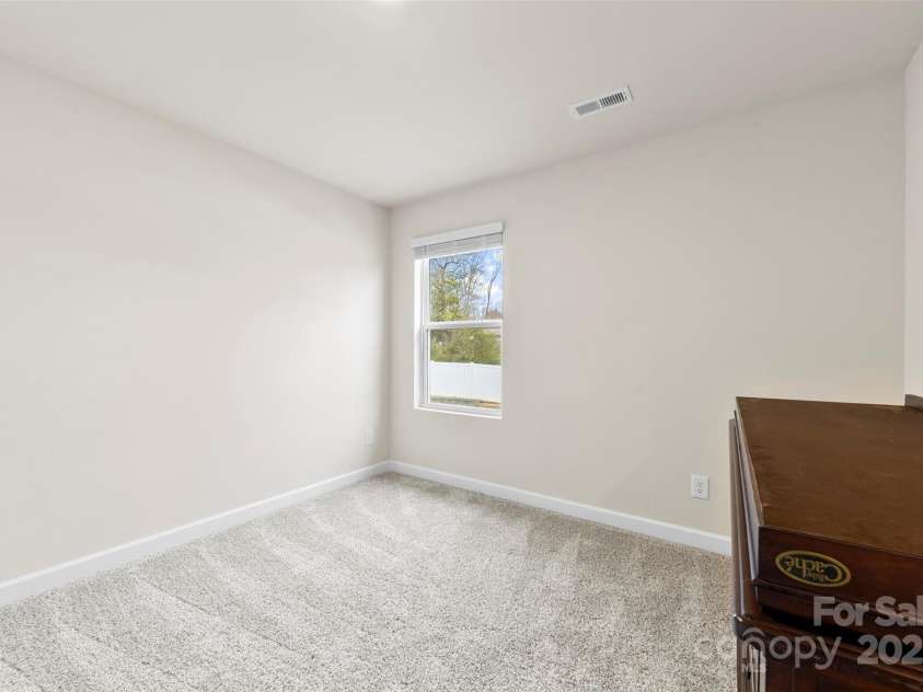 916 Clementine Road, Monroe, NC 28110.  MLS# CAR4232082, YatesRealty ID 9968. Bedroom 1