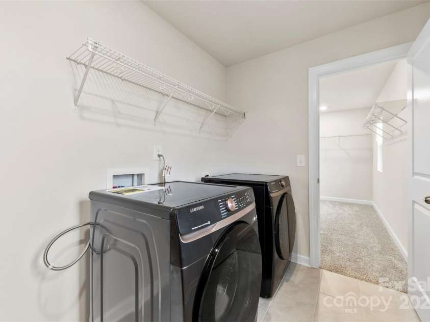 916 Clementine Road, Monroe, NC 28110.  MLS# CAR4232082, YatesRealty ID 9968. Laundry Room Connected to Primary Closet