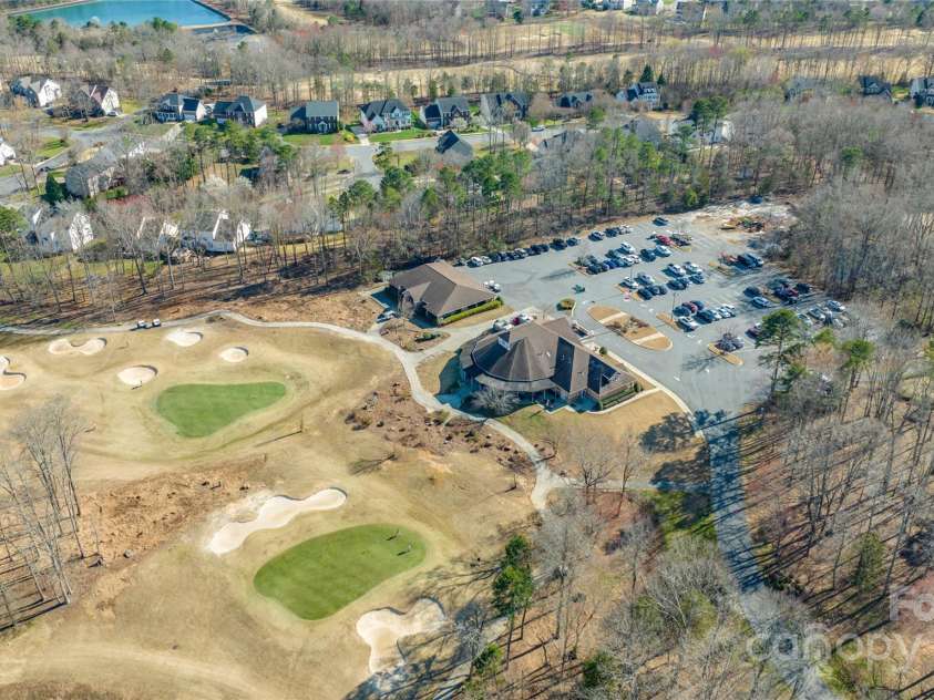 10615 Persimmon Creek Drive, Mint Hill, NC 28227.  MLS# CAR4232856, YatesRealty ID 9969. Aerial of Olde Sycamore Clubhouse and Golf Course