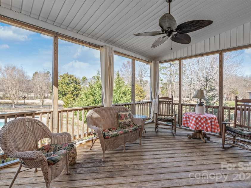 10615 Persimmon Creek Drive, Mint Hill, NC 28227.  MLS# CAR4232856, YatesRealty ID 9969. Beautiful Screened Porch Overlooking Saltwater Pool and Golf Course
