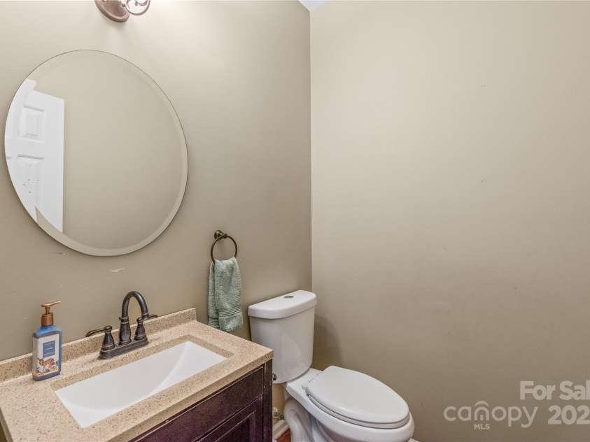 10615 Persimmon Creek Drive, Mint Hill, NC 28227.  MLS# CAR4232856, YatesRealty ID 9969. Half Bath on Main