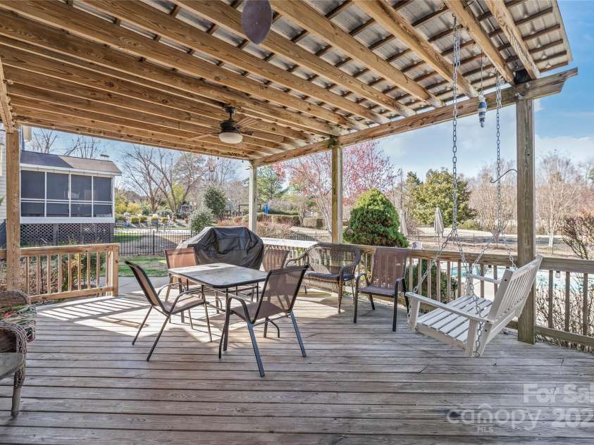 10615 Persimmon Creek Drive, Mint Hill, NC 28227.  MLS# CAR4232856, YatesRealty ID 9969. Large Deck with Pergola