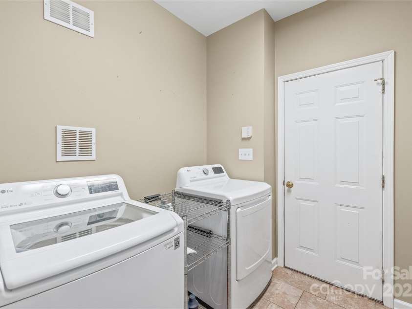 10615 Persimmon Creek Drive, Mint Hill, NC 28227.  MLS# CAR4232856, YatesRealty ID 9969. Laundry Room on Main