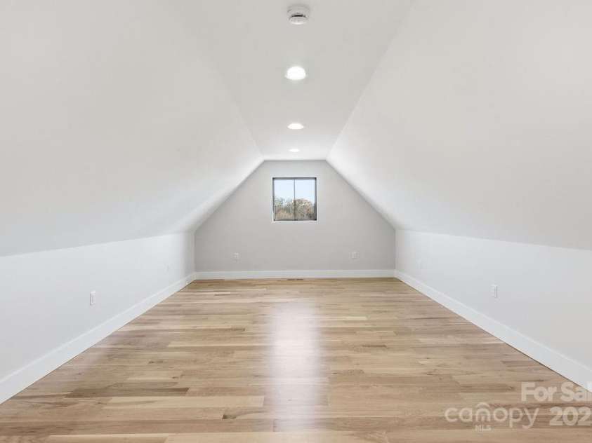 202 Westridge Farm Road, Asheville, NC 28804.  MLS# CAR4312762, YatesRealty ID 997. Flex space over garage ideal  for  fitness room, art studio, or recreation room