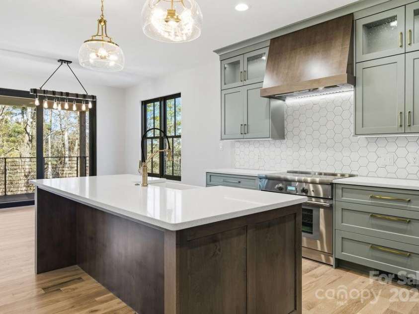 202 Westridge Farm Road, Asheville, NC 28804.  MLS# CAR4312762, YatesRealty ID 997. Large island perfect for prep, gathering, and entertaining