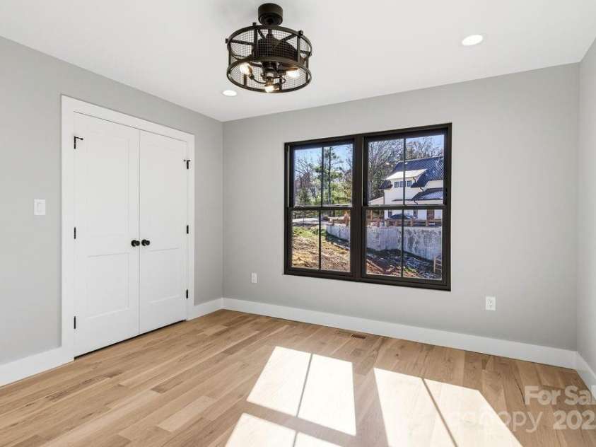 202 Westridge Farm Road, Asheville, NC 28804.  MLS# CAR4312762, YatesRealty ID 997. Light-filled secondary bedrooms with generous closets