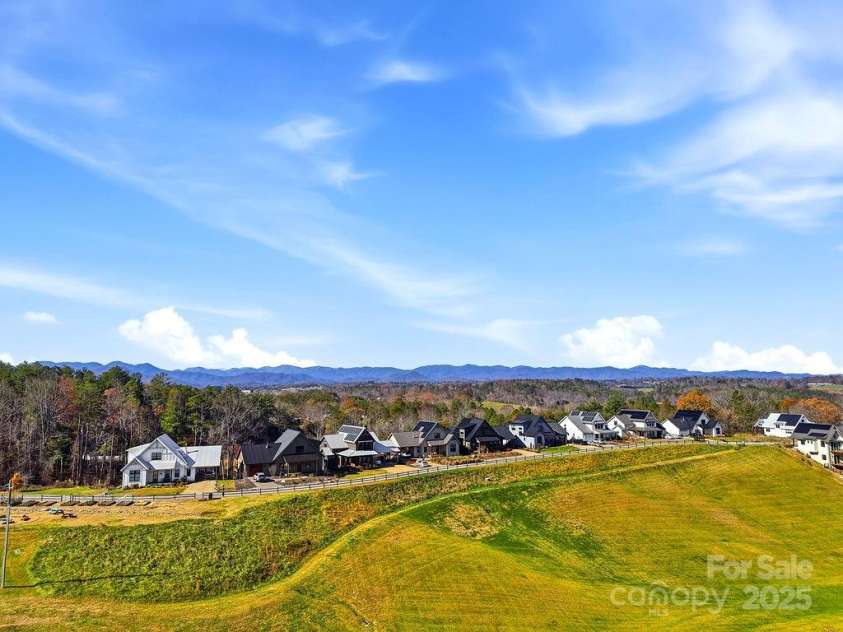 202 Westridge Farm Road, Asheville, NC 28804.  MLS# CAR4312762, YatesRealty ID 997. Outdoor living space steps away from parks, trails, and Olivette Farm