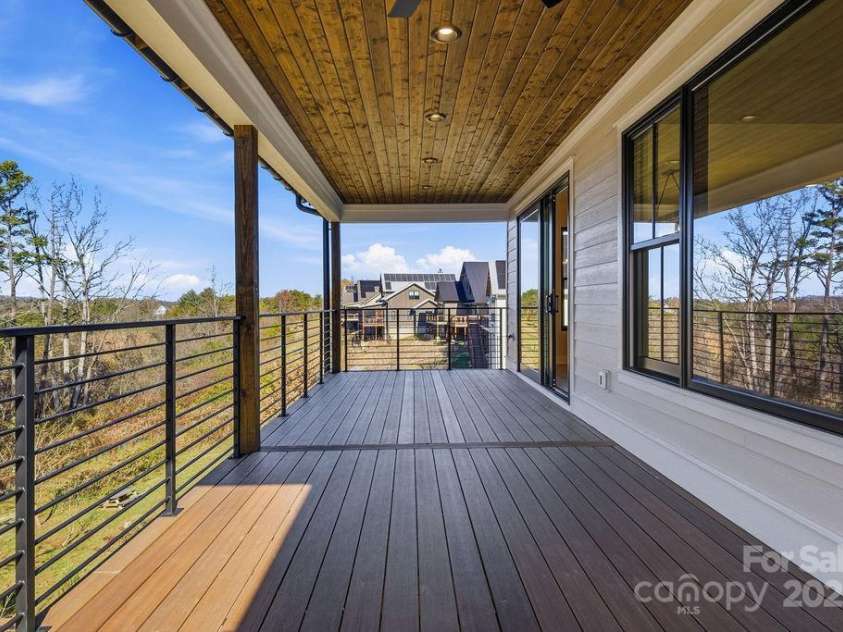 202 Westridge Farm Road, Asheville, NC 28804.  MLS# CAR4312762, YatesRealty ID 997. Rear porch with breathtaking western sunset views over the Blue Ridge Mountains