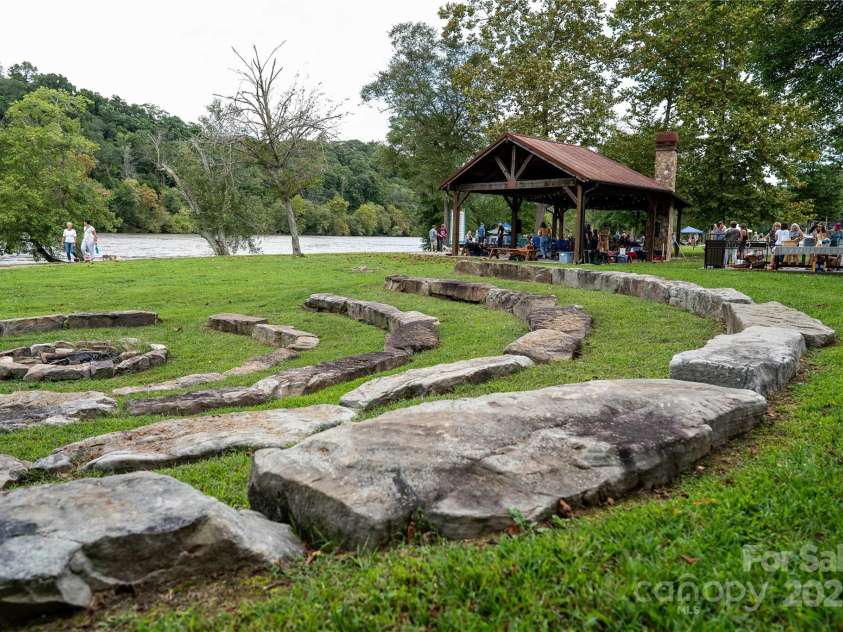 202 Westridge Farm Road, Asheville, NC 28804.  MLS# CAR4312762, YatesRealty ID 997. Riverside amphitheater designed for community events and sunset gatherings