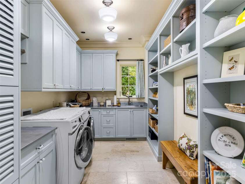 616 Old Growth Forest Road, Burnsville, NC 28714.  MLS# CAR4076276, YatesRealty ID 997. Here is your Main Floor Laundry Room extraordinaire