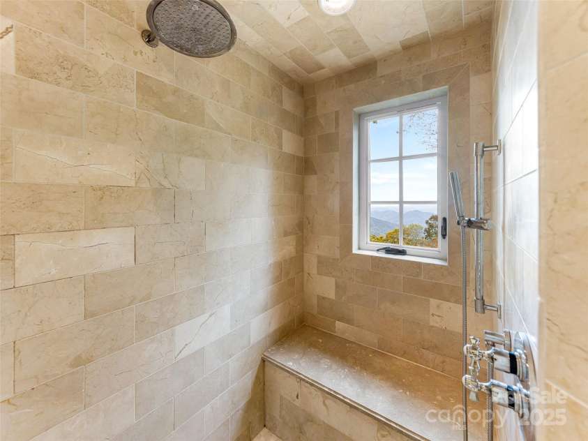616 Old Growth Forest Road, Burnsville, NC 28714.  MLS# CAR4076276, YatesRealty ID 997. Yes! The views continue in the shower!