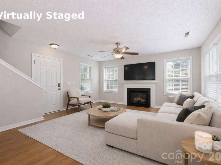 9314 Meadowmont View Drive, Charlotte, NC 28269.  MLS# CAR4360345, YatesRealty ID 9971. Virtually staged living room