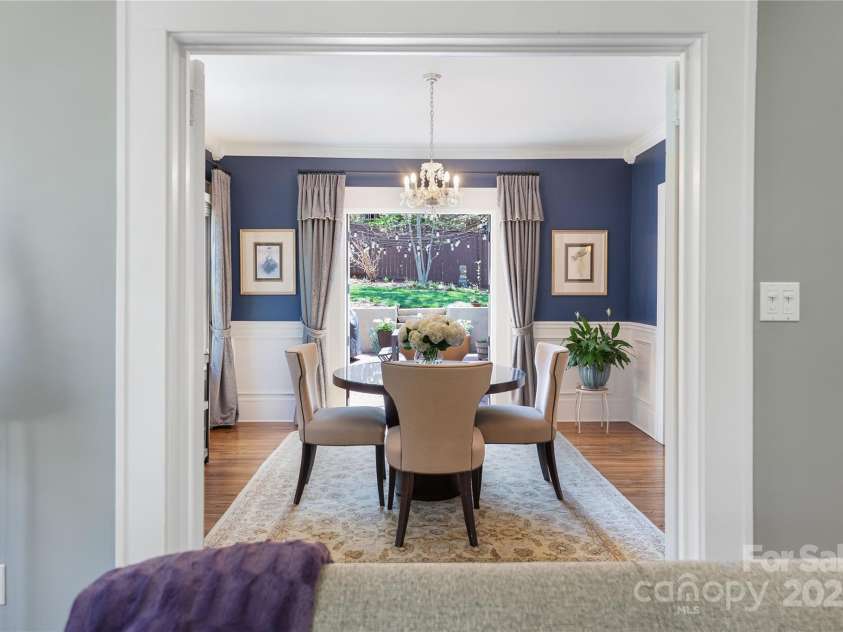 15 Warwick Road, Asheville, NC 28803.  MLS# CAR4249435, YatesRealty ID 9975. Living Room looking through dining room to courtyard