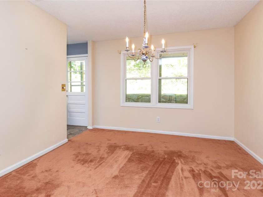 6 Woodmere Drive, Arden, NC 28704.  MLS# CAR4250778, YatesRealty ID 9980. 