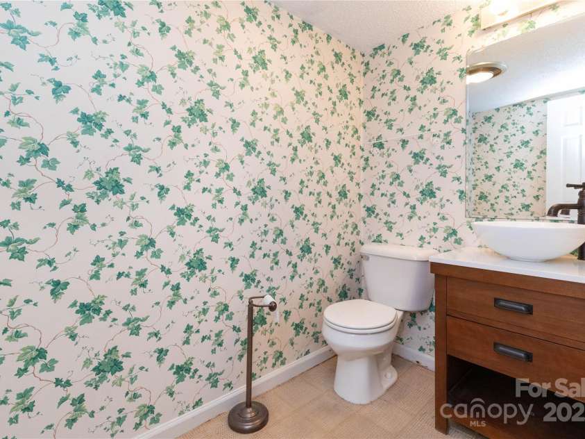 6 Woodmere Drive, Arden, NC 28704.  MLS# CAR4250778, YatesRealty ID 9980. 