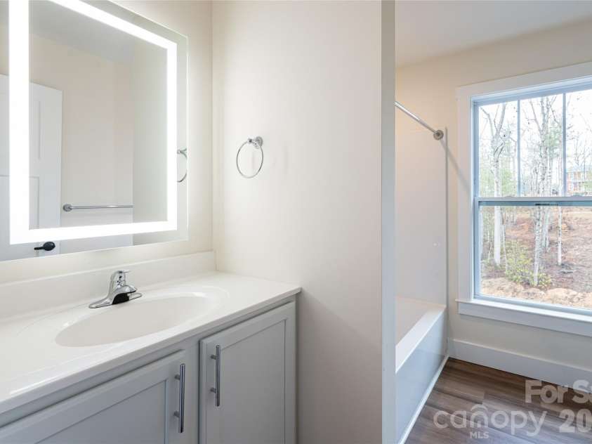 204 Cascade Ridge Road, Fairview, NC 28730.  MLS# CAR4315304, YatesRealty ID 9983. Guest Bath Upper Floor