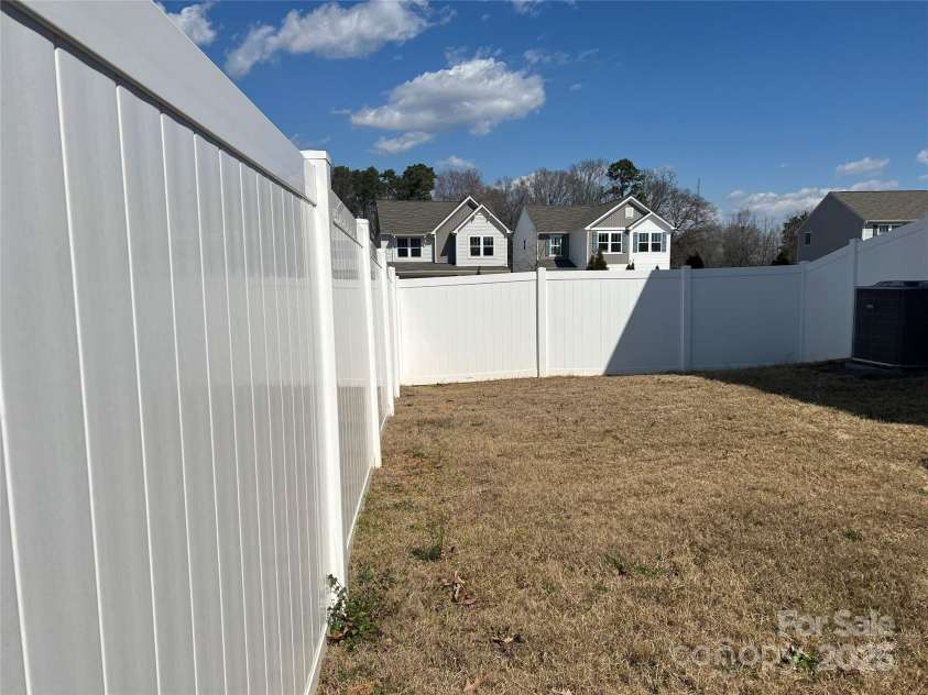 202 J.P. Drive, Albemarle, NC 28001.  MLS# CAR4229112, YatesRealty ID 9987. Backyard enclosed by 6