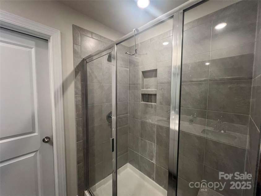 202 J.P. Drive, Albemarle, NC 28001.  MLS# CAR4229112, YatesRealty ID 9987. Master bath shower