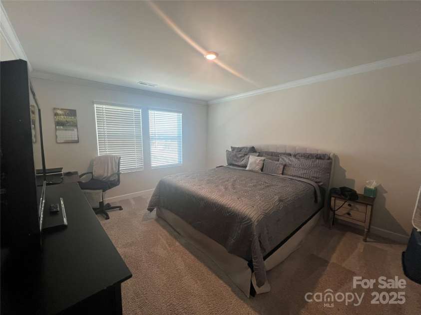 202 J.P. Drive, Albemarle, NC 28001.  MLS# CAR4229112, YatesRealty ID 9987. Master bedroom