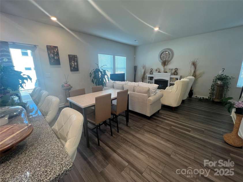 202 J.P. Drive, Albemarle, NC 28001.  MLS# CAR4229112, YatesRealty ID 9987. Open floor plan, Dining area and Living room area from Kitchen