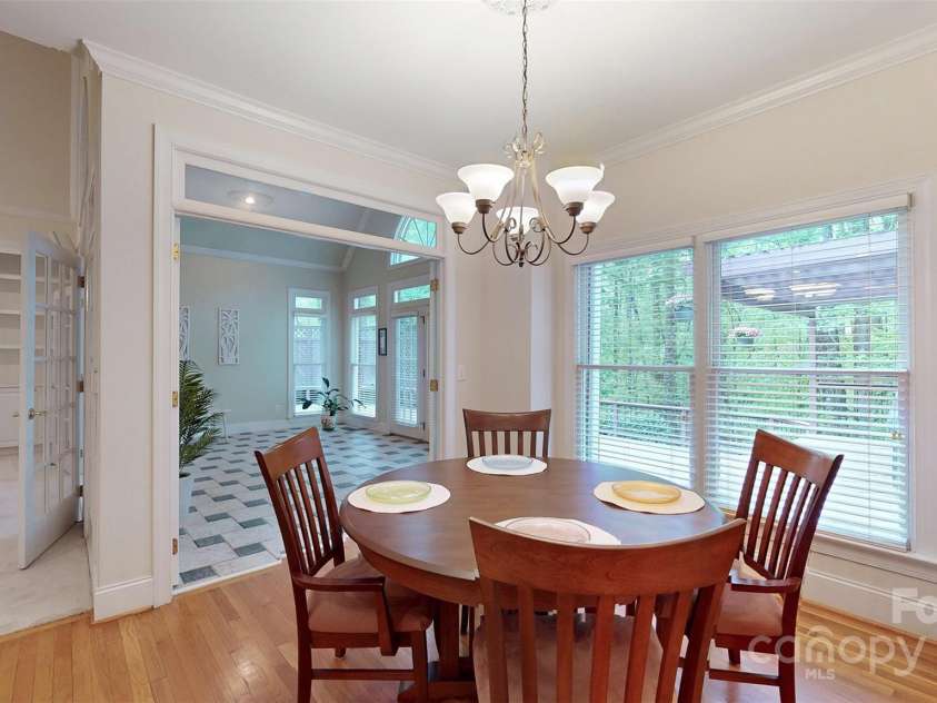 9101 Oak Bluff Court, Marvin, NC 28173.  MLS# CAR4245021, YatesRealty ID 9989. Breakfast nook can be opened to sunroom