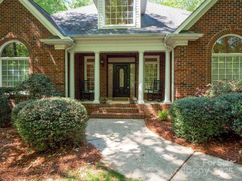 9101 Oak Bluff Court, Marvin, NC 28173.  MLS# CAR4245021, YatesRealty ID 9989. Spacious front porch