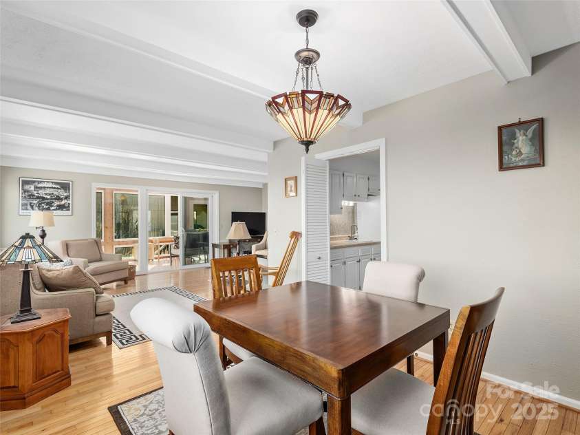 516 Davis Mountain Road, Hendersonville, NC 28739.  MLS# CAR4221083, YatesRealty ID 999. Dining area looking toward living room