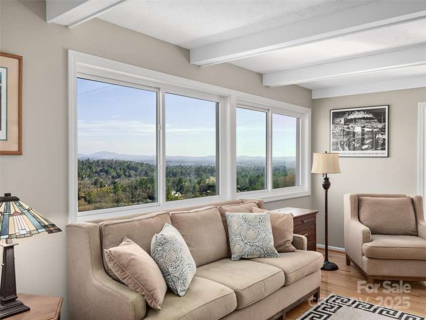 516 Davis Mountain Road, Hendersonville, NC 28739.  MLS# CAR4221083, YatesRealty ID 999. Mountain views from living room