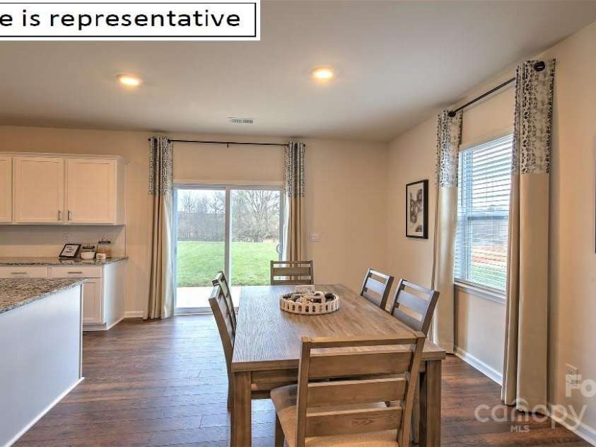1362 Secrest Commons Drive, Monroe, NC 28112.  MLS# CAR4252324, YatesRealty ID 9996. Breakfast area with kitchen and patio doors