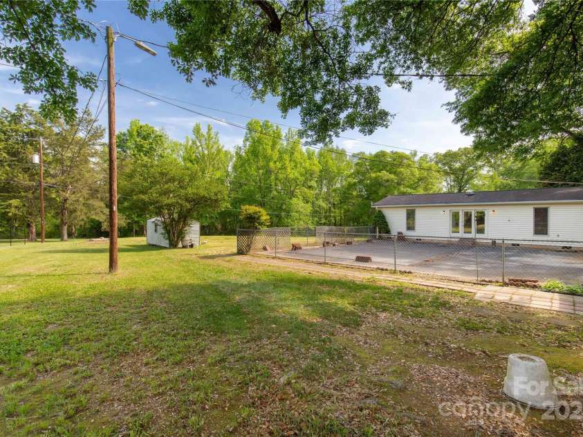 2007 Green Peach Road, Lancaster, SC 29720.  MLS# CAR4249856, YatesRealty ID 9997. Pool area is fenced in