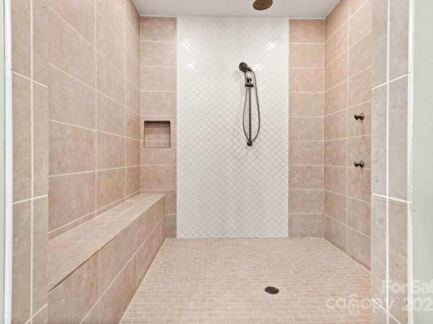 206 Oxford Place Drive, Fort Mill, SC 29715.  MLS# CAR4248553, YatesRealty ID 9999. Expansive shower that is large enough to add a vessel tub
